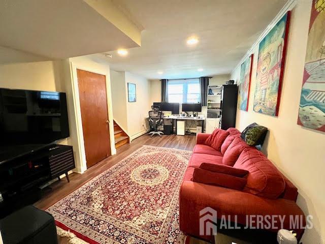 45 Browning Ave, Ewing, NJ 08638 - living room with stairs, a desk, and wood finished floors