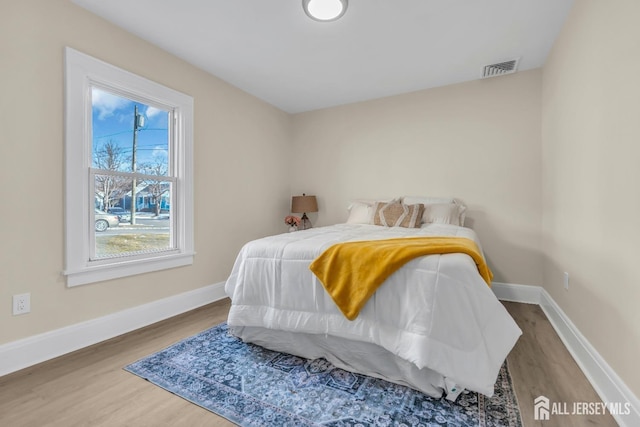 221 E Golf Ave, South Plainfield, NJ 07080 - bedroom with wood finished floors and baseboards