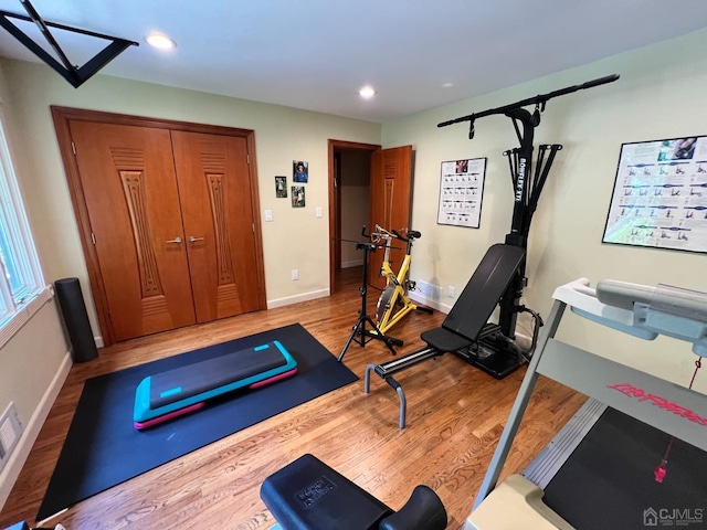 2 Gloucester Ct, East Brunswick, NJ 08816 - workout area with baseboards, recessed lighting, and wood finished floors