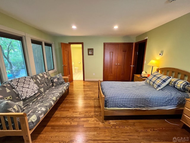 2 Gloucester Ct, East Brunswick, NJ 08816 - bedroom with baseboards, ensuite bathroom, recessed lighting, and wood finished floors