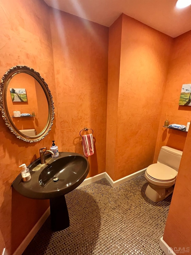 2 Gloucester Ct, East Brunswick, NJ 08816 - half bathroom featuring a sink and toilet