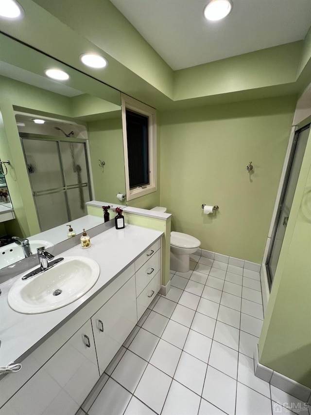 2 Gloucester Ct, East Brunswick, NJ 08816 - full bathroom featuring toilet, a stall shower, baseboards, tile patterned flooring, and vanity