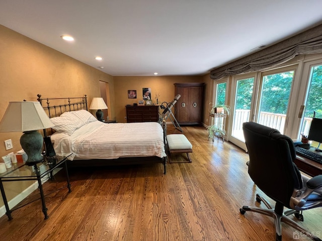 2 Gloucester Ct, East Brunswick, NJ 08816 - bedroom with access to outside, wood finished floors, baseboards, and recessed lighting
