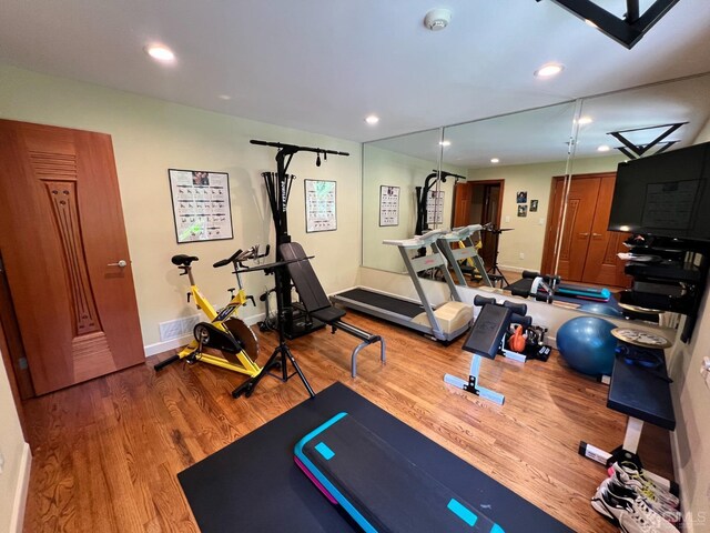 2 Gloucester Ct, East Brunswick, NJ 08816 - exercise room with wood finished floors, baseboards, and recessed lighting