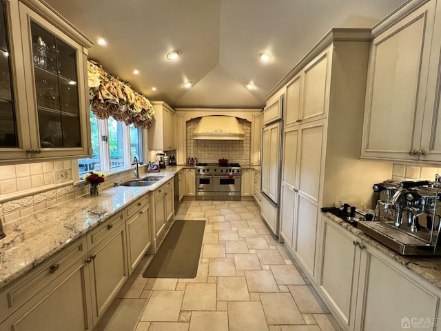 2 Gloucester Ct, East Brunswick, NJ 08816 - kitchen featuring a sink, custom exhaust hood, stone tile floors, decorative backsplash, and double oven range
