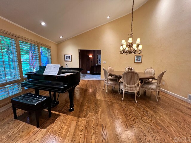2 Gloucester Ct, East Brunswick, NJ 08816 - interior space with baseboards, ornamental molding, an inviting chandelier, and wood finished floors