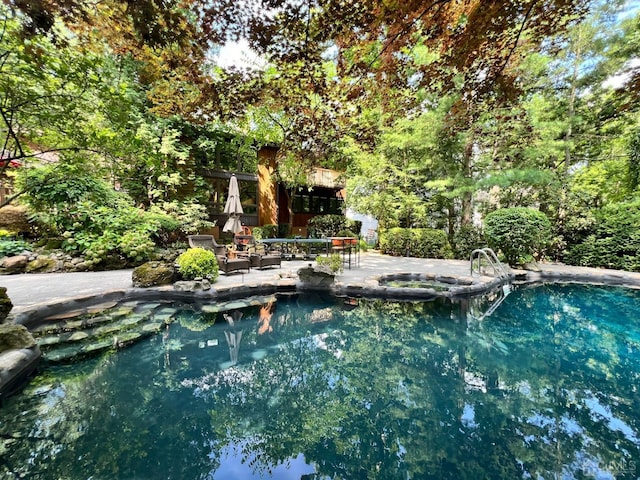 2 Gloucester Ct, East Brunswick, NJ 08816 - view of pool featuring a patio area and a pool with connected hot tub