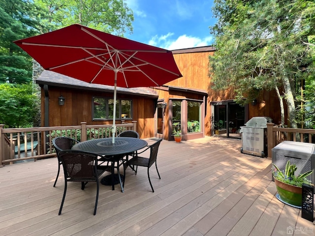 2 Gloucester Ct, East Brunswick, NJ 08816 - wooden terrace with area for grilling and outdoor dining space