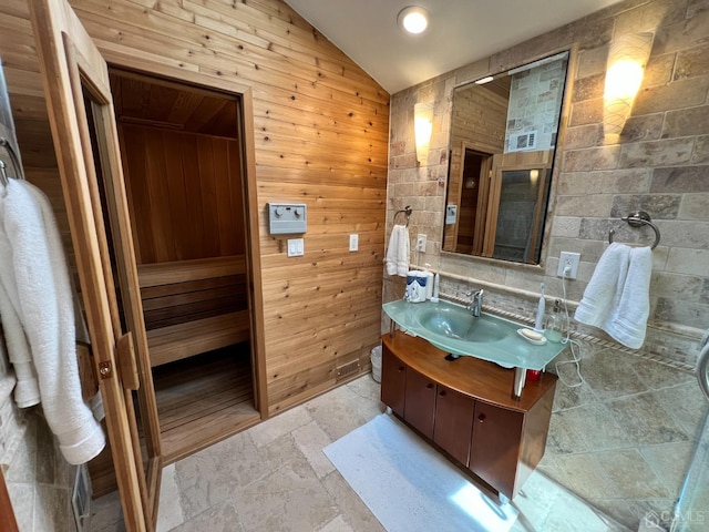 2 Gloucester Ct, East Brunswick, NJ 08816 - bathroom with lofted ceiling, stone tile flooring, wooden walls, a sauna, and vanity