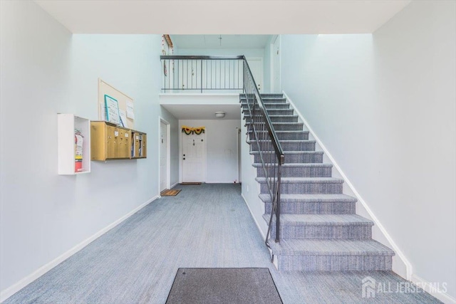 111 Beverly Hill Ter Unit A, Woodbridge Proper, NJ 07095 - staircase with a high ceiling, baseboards, and carpet flooring