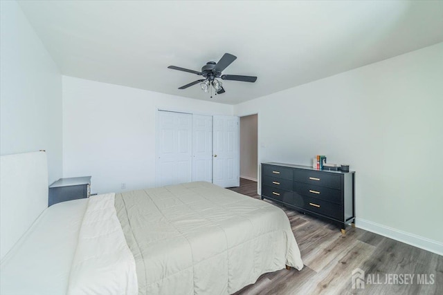 111 Beverly Hill Ter Unit A, Woodbridge Proper, NJ 07095 - bedroom with wood finished floors, a closet, baseboards, and ceiling fan