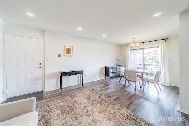 111 Beverly Hill Ter Unit A, Woodbridge Proper, NJ 07095 - living room with a chandelier, wood finished floors, baseboards, and recessed lighting