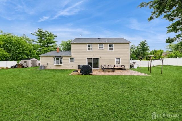 1 Webster Rd, Franklin, NJ 08873 - rear view of property featuring a patio area, a chimney, and central AC unit