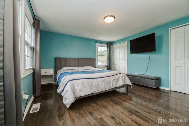 1 Webster Rd, Franklin, NJ 08873 - bedroom featuring two closets, wood finished floors, and baseboards