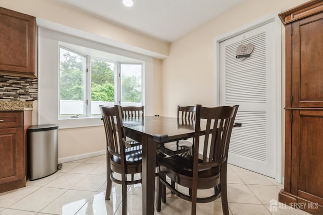 1 Webster Rd, Franklin, NJ 08873 - dining area featuring light tile patterned flooring, baseboards, and recessed lighting