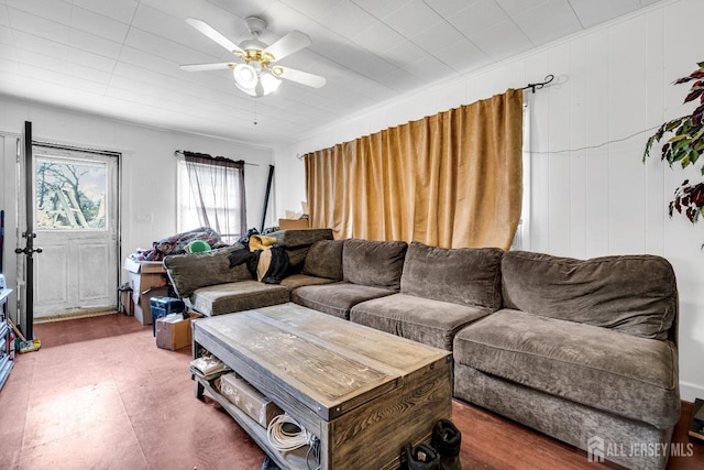 living area with ceiling fan