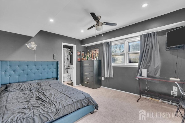 carpeted bedroom featuring recessed lighting, a ceiling fan, baseboards, and ensuite bath