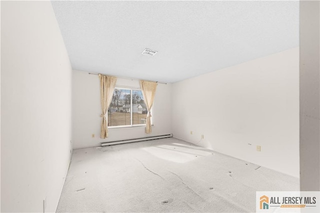 40 Haddon Rd Unit 40B, Monroe, NJ 08831 - carpeted spare room featuring a baseboard radiator