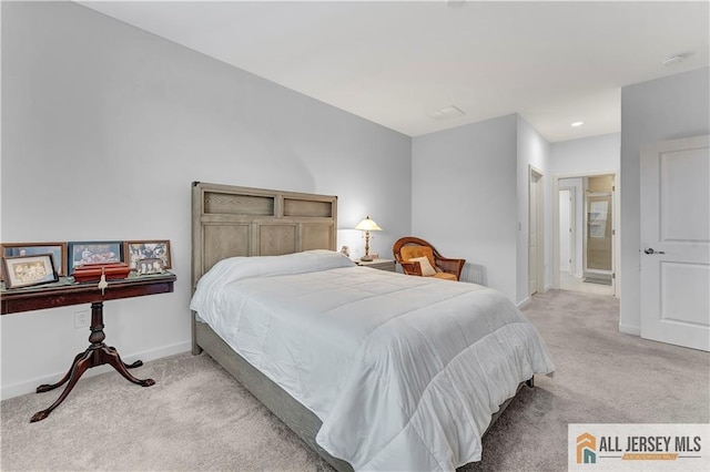 bedroom featuring baseboards and carpet