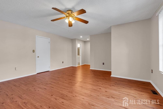 47 Covington Ct, East Brunswick, NJ 08816 - empty room with ceiling fan, light wood finished floors, recessed lighting, and a textured ceiling