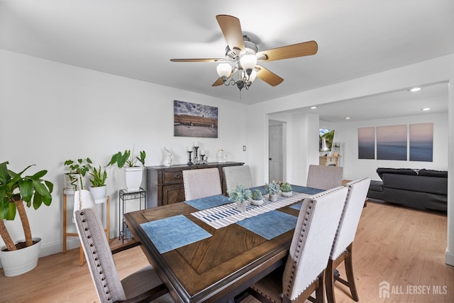 dining room with baseboards, ceiling fan, light wood-style flooring, and recessed lighting