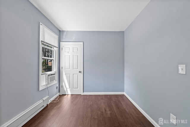 41 Guilden St, New Brunswick, NJ 08901 - spare room featuring a baseboard radiator, wood finished floors, and cooling unit