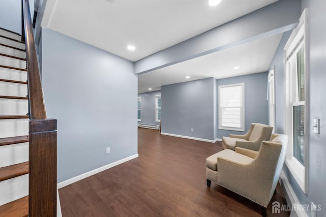 41 Guilden St, New Brunswick, NJ 08901 - sitting room with wood finished floors, stairs, a baseboard heating unit, and recessed lighting