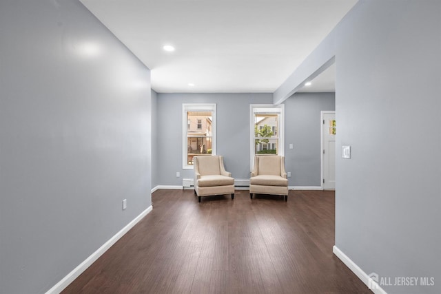 41 Guilden St, New Brunswick, NJ 08901 - living area featuring dark wood-style flooring, recessed lighting, baseboard heating, and a baseboard radiator