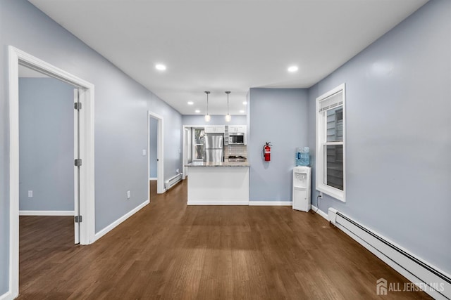 41 Guilden St, New Brunswick, NJ 08901 - kitchen featuring a baseboard radiator, appliances with stainless steel finishes, dark wood-style flooring, recessed lighting, and pendant lighting