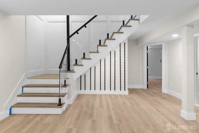116 Hunt Dr, Princeton, NJ 08540 - stairs featuring baseboards, wood finished floors, and recessed lighting
