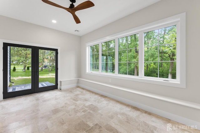 116 Hunt Dr, Princeton, NJ 08540 - empty room with stone finish flooring, a ceiling fan, french doors, and baseboards