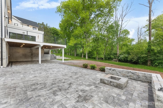 116 Hunt Dr, Princeton, NJ 08540 - view of patio with a balcony and an outdoor fire pit