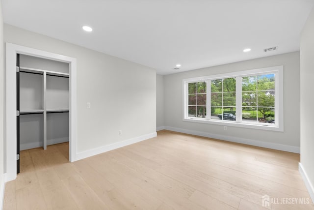 116 Hunt Dr, Princeton, NJ 08540 - unfurnished bedroom featuring baseboards, light wood finished floors, a spacious closet, recessed lighting, and a closet