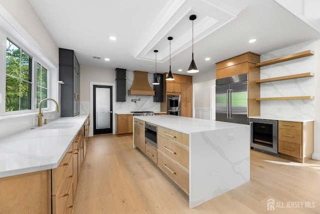 116 Hunt Dr, Princeton, NJ 08540 - kitchen featuring wine cooler, appliances with stainless steel finishes, premium range hood, a sink, and open shelves