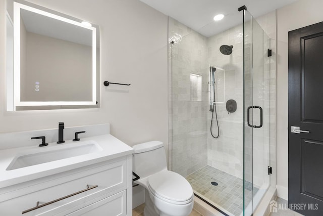 116 Hunt Dr, Princeton, NJ 08540 - bathroom with toilet, vanity, a stall shower, and recessed lighting