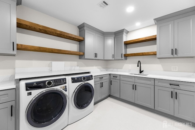 116 Hunt Dr, Princeton, NJ 08540 - laundry area with washer and clothes dryer, cabinet space, and recessed lighting