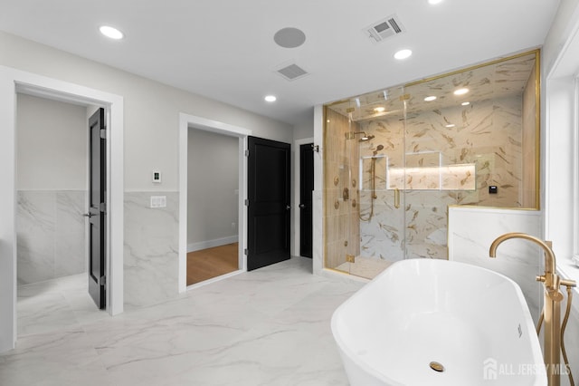 116 Hunt Dr, Princeton, NJ 08540 - full bath with marble tiled floors, a marble finish shower, recessed lighting, a freestanding tub, and tile walls