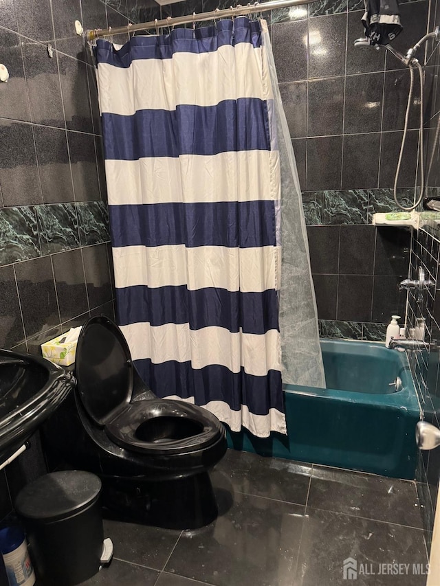 87-89 1st St, Perth Amboy, NJ 08861 - full bathroom with tile walls, toilet, shower / bath combo with shower curtain, and tile patterned floors