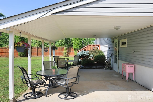 505 Runyon Ave, Piscataway, NJ 08854 - view of patio with outdoor dining space and a carport
