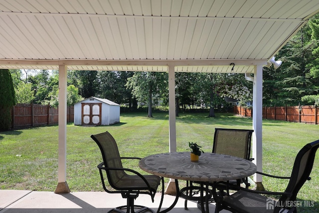 505 Runyon Ave, Piscataway, NJ 08854 - fenced backyard with a patio area and a storage shed