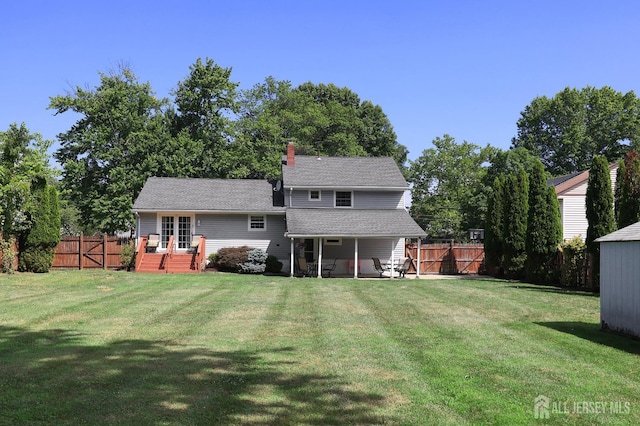 505 Runyon Ave, Piscataway, NJ 08854 - rear view of house with a fenced backyard, a deck, roof with shingles, and a patio area