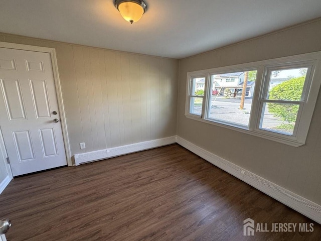 43 Overbrook Dr, Colonia, NJ 07067 - unfurnished room with baseboards and dark wood-style flooring