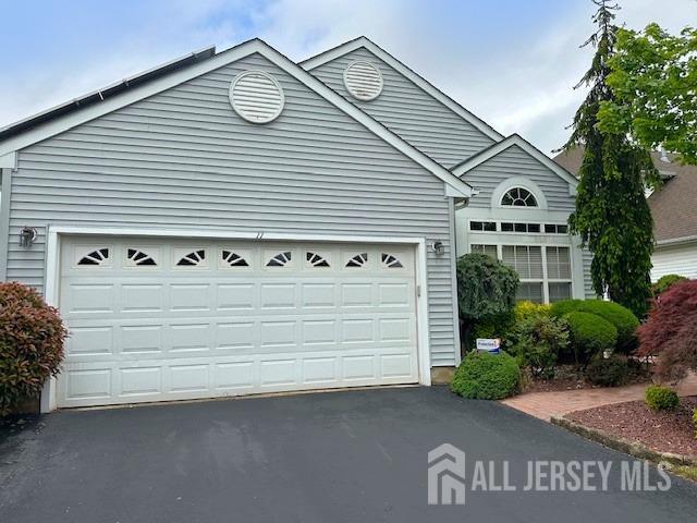 garage with driveway