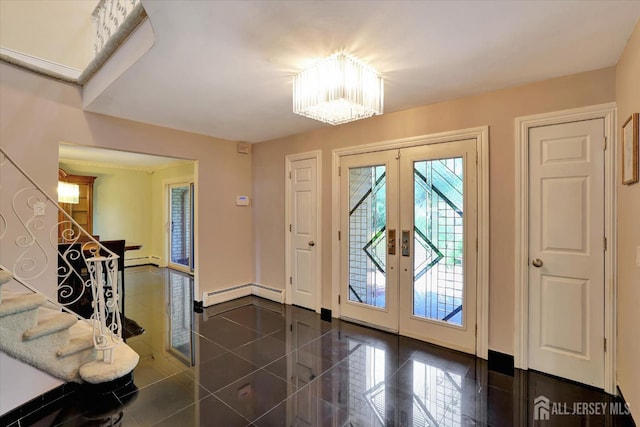 403 New Dover Rd, Colonia, NJ 07067 - foyer entrance featuring french doors, a chandelier, stairs, granite floors, and baseboard heating