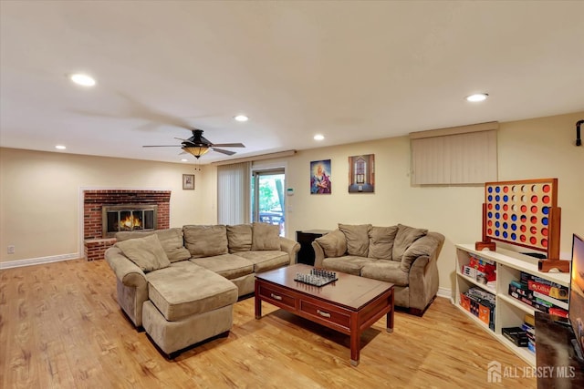 403 New Dover Rd, Colonia, NJ 07067 - living room with recessed lighting, light wood-type flooring, a ceiling fan, and a brick fireplace