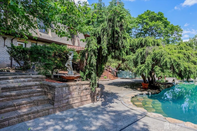 403 New Dover Rd, Colonia, NJ 07067 - outdoor pool featuring a patio area and stairway