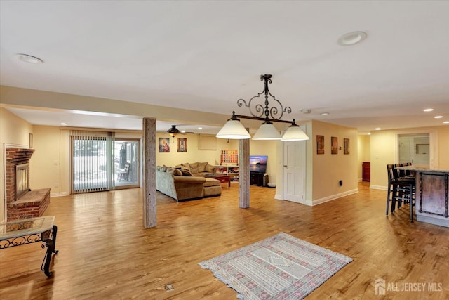 403 New Dover Rd, Colonia, NJ 07067 - living area with a fireplace, recessed lighting, and light wood-type flooring