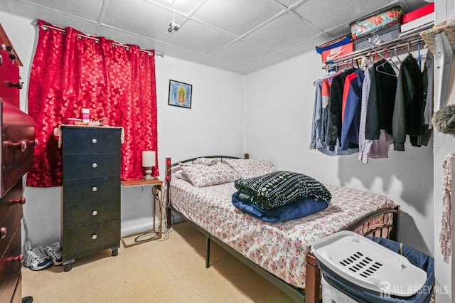 188 Seaman St, New Brunswick, NJ 08901 - bedroom with a paneled ceiling and tile patterned floors