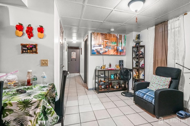 188 Seaman St, New Brunswick, NJ 08901 - living area featuring a paneled ceiling and light tile patterned floors