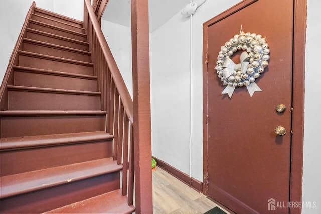 188 Seaman St, New Brunswick, NJ 08901 - staircase with wood finished floors and baseboards